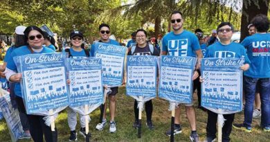 May Day march draws hundreds in solidarity with striking workers